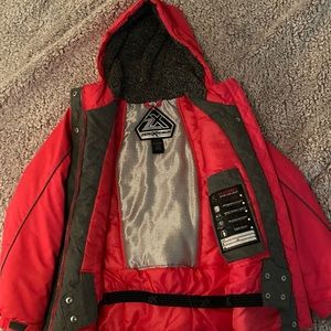 Size 8-12 warm jackets. Pink jacket worn once. Gold and white puffer worn a lot